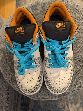 Nike Kids Dunk Low Pro in White with Blue Laces and Orange Lining